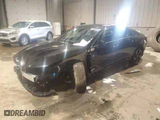 2025 Kia K5 GT-Line with VIN KNAG64J7XS5316220, listed as a Copart auction lot 87250534 with 3,946 mi miles and Salvage Title. Bid and sale history available at carsss.com. Image 1.