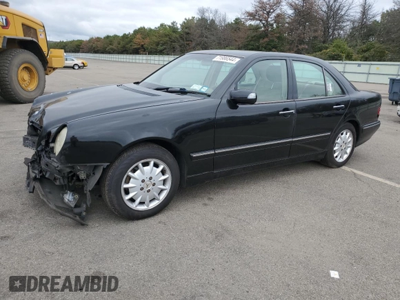 2001 Mercedes-Benz E-Class AWD with VIN WDBJF82J91X060969, listed as a Copart auction lot 71986544 with 113,694 mi miles and Salvage Title. Bid and sale history available at carsss.com. Image 1.