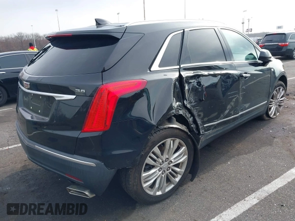 2018 Cadillac XT5 Premium Luxury FWD with VIN 1GYKNERS4JZ198830, listed as a IAAI auction lot 41887088 with 91,515 mi miles. Bid and sale history available at carsss.com. Image 4.