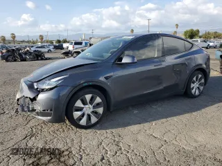 2021 Tesla Model Y Standard Range with VIN 5YJYGDED7MF109418, listed as a Copart auction lot 51590135 with 86,668 mi miles and Salvage Title. Bid and sale history available at DreamBid. Image 1.