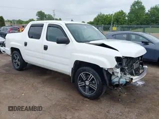 2014 Honda Ridgeline Sport z VIN 5FPYK1F70EB009711, wystawiony jako IAAI lot #42343485 z przebiegiem 154 317 mil mil oraz . Historia ofert i sprzedaży dostępna na DreamBid. Obrazek 1.