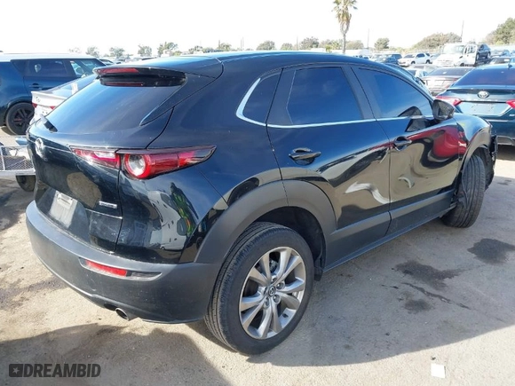 2021 Mazda CX-30 Select with VIN 3MVDMABL6MM248533, listed as a IAAI auction lot 41410489 with 82,365 mi miles. Bid and sale history available at carsss.com. Image 4.