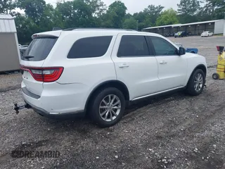 2016 Dodge Durango SXT with VIN 1C4RDHAG2GC330995, listed as a IAAI auction lot 42410612 with 118,412 mi miles and . Bid and sale history available at DreamBid. Image 4.