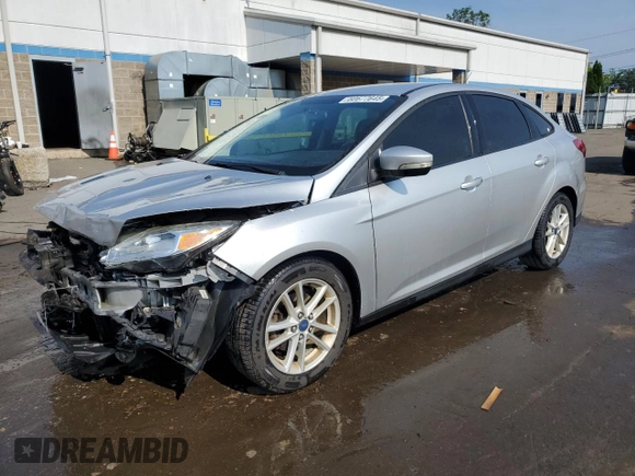 2015 Ford Focus SE with VIN 1FADP3F2XFL321208, listed as a Copart auction lot 61413005 with 139,439 mi miles and Salvage title. Bid and sale history available at DreamBid. Image 1.