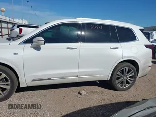 2021 Cadillac XT6 Premium Luxury z VIN 1GYKPCRS6MZ230499, wystawiony jako IAAI lot #41808404 z przebiegiem 86 933 mil mil oraz . Historia ofert i sprzedaży dostępna na DreamBid. Obrazek 15.