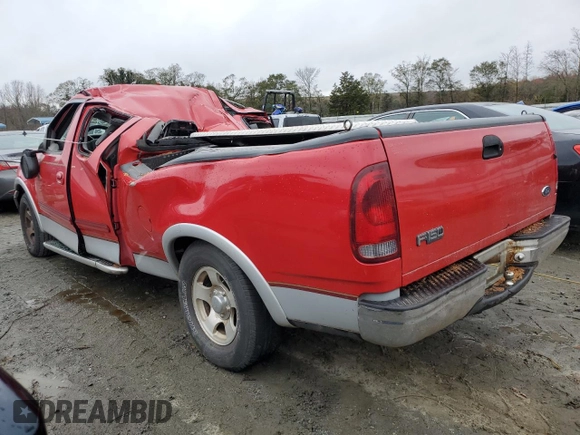 1999 Ford F-150 with VIN 1FTRX17W3XNA26575, listed as a Copart auction lot 81508484 with 138,704 mi miles and Salvage title. Bid and sale history available at DreamBid. Image 2.