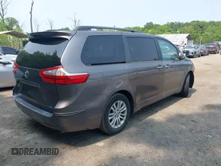 2015 Toyota Sienna XLE with VIN 5TDYK3DC6FS553695, listed as a IAAI auction lot 42418507 with 137,677 mi miles and . Bid and sale history available at DreamBid. Image 4.