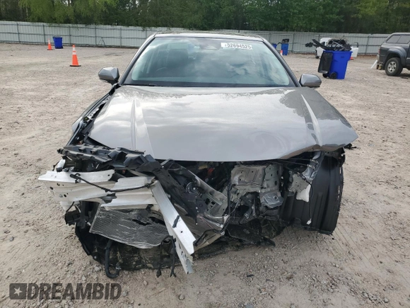 2025 Toyota Camry LE with VIN 4T1DAACKXSU556874, listed as a Copart auction lot 52694525 with 7,076 mi miles and Salvage Title. Bid and sale history available at carsss.com. Image 5.