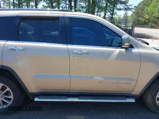 2015 Jeep Grand Cherokee Limited with VIN 1C4RJFBG2FC643264, listed as a IAAI auction lot 42151555 with 116,797 mi miles. Bid and sale history available at carsss.com. Image 13.