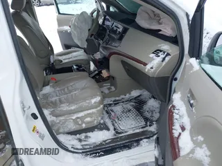2014 Toyota Sienna XLE with VIN 5TDYK3DC9ES442525, listed as a IAAI auction lot 41502770 with Not provided miles and . Bid and sale history available at DreamBid. Image 5.