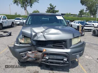 2007 Honda Ridgeline RTL with VIN 2HJYK16547H502601, listed as a IAAI auction lot 42484634 with 197,253 mi miles and . Bid and sale history available at DreamBid. Image 12.