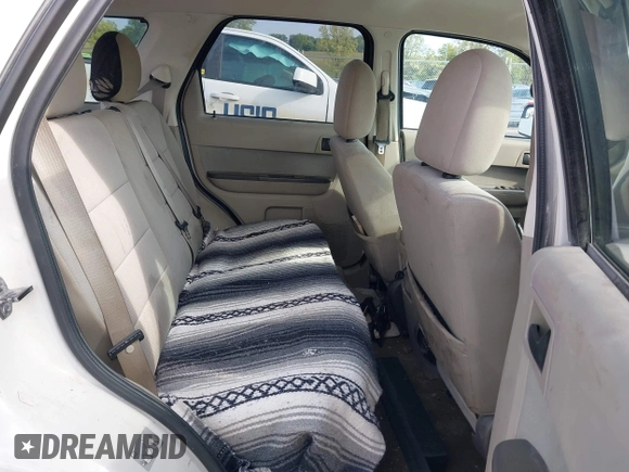 2010 Ford Escape Hybrid z VIN 1FMCU5K31AKD22069, wystawiony jako IAAI lot #40151027 z przebiegiem 185 932 mil mil oraz . Historia ofert i sprzedaży dostępna na DreamBid. Obrazek 8.