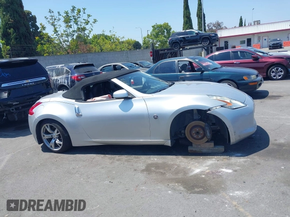 2010 Nissan 370Z Touring с VIN JN1AZ4FH3AM303737, выставлен на аукционе IAAI как лот 42416041 с пробегом 102 381 миль миль и . История ставок и продаж доступна на DreamBid. Изображение 13.