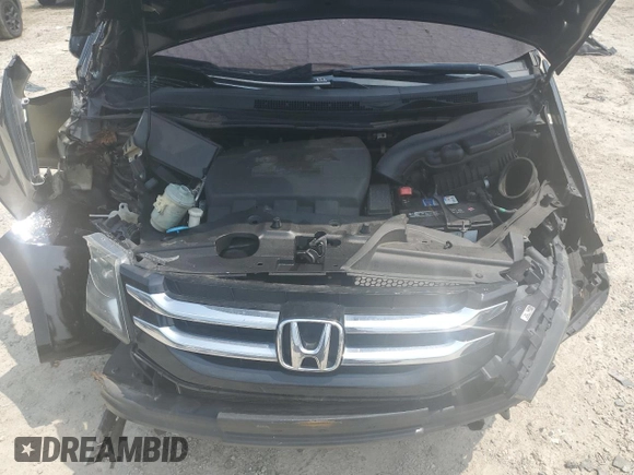 2014 Honda Odyssey EX-L with VIN 5FNRL5H68EB098207, listed as a Copart auction lot 66700024 with 161,701 mi miles and Salvage Title. Bid and sale history available at DreamBid. Image 13.