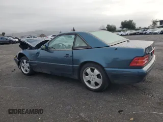 2000 Mercedes-Benz SL-Class with VIN WDBFA68F2YF189776, listed as a Copart auction lot 86550124 with 107,479 mi miles and Salvage Title. Bid and sale history available at carsss.com. Image 2.