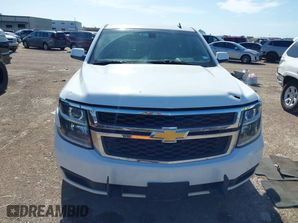 2015 Chevrolet Tahoe Commercial z VIN 1GNLC2EC8FR255526, wystawiony jako IAAI lot #42538320 z przebiegiem 165 502 mil mil oraz . Historia ofert i sprzedaży dostępna na DreamBid. Obrazek 12.