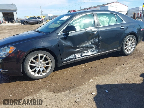 2011 Chevrolet Malibu LTZ with VIN 1G1ZE5E18BF143021, listed as a IAAI auction lot 41802508 with 148,866 mi miles and . Bid and sale history available at DreamBid. Image 14.