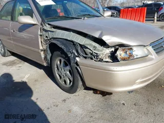 2001 Toyota Camry CE with VIN 4T1BG22K91U114096, listed as a IAAI auction lot 41070221 with 123,637 mi miles. Bid and sale history available at carsss.com. Image 6.