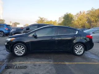 2014 Kia Forte EX with VIN KNAFX4A8XE5121630, listed as a IAAI auction lot 40517819 with 144,087 mi miles. Bid and sale history available at carsss.com. Image 14.