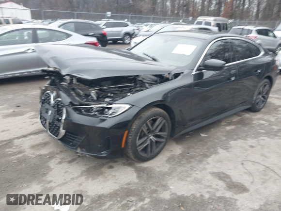 2024 BMW 4 Series 430i xDrive with VIN WBA73AV05RFS35389, listed as a IAAI auction lot 41144465 with 14,661 mi miles. Bid and sale history available at carsss.com. Image 2.