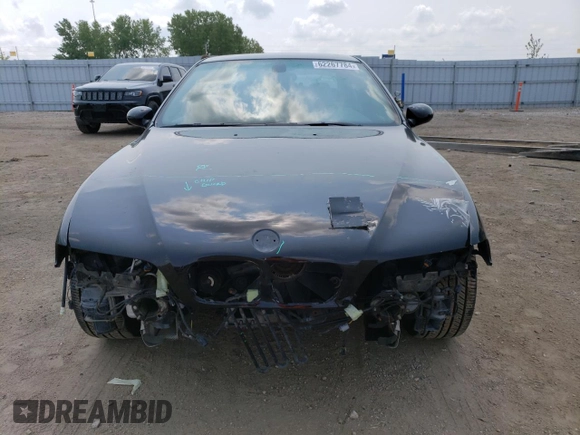 2003 BMW M5 z VIN WBSDE93473CF92968, wystawiony jako Copart lot #62267784 z przebiegiem Nie podano mil oraz Szkody całkowita. Historia ofert i sprzedaży dostępna na DreamBid. Obrazek 5.