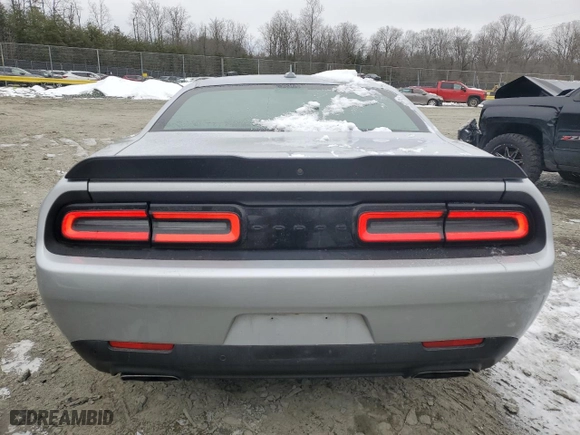 2021 Dodge Challenger R/T with VIN 2C3CDZBTXMH631308, listed as a Copart auction lot 88821085 with 57,259 mi miles and Salvage Title. Bid and sale history available at carsss.com. Image 6.