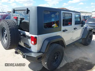 2008 Jeep Wrangler Unlimited Rubicon with VIN 1J4GA69178L550598, listed as a IAAI auction lot 42232887 with 99,637 mi miles and . Bid and sale history available at carsss.com. Image 4.
