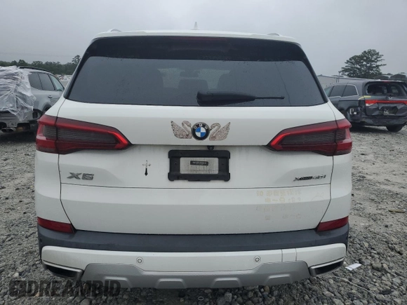 2019 BMW X5 xDrive40i z VIN 5UXCR6C56KLL40086, wystawiony jako Copart lot #58301335 z przebiegiem Nie podano mil oraz Szkoda całkowita • Salvage title. Historia ofert i sprzedaży dostępna na DreamBid. Obrazek 6.
