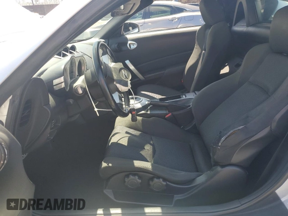 2007 Nissan 350Z Enthusiast z VIN JN1BZ36AX7M651304, wystawiony jako Copart lot #57164945 z przebiegiem 83 332 mil mil oraz Szkoda całkowita • Salvage title. Historia ofert i sprzedaży dostępna na DreamBid. Obrazek 7.