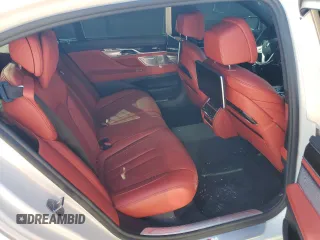 2019 BMW 7 Series 750i with VIN WBA7F0C5XKGM25348, listed as a Copart auction lot 46537485 with 54,365 mi miles and Salvage title. Bid and sale history available at DreamBid. Image 10.