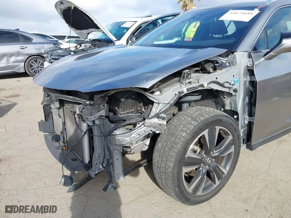 2021 Lexus UX with VIN JTHX3JBH4M2043263, listed as a IAAI auction lot 41671055 with 100,589 mi miles. Bid and sale history available at carsss.com. Image 6.