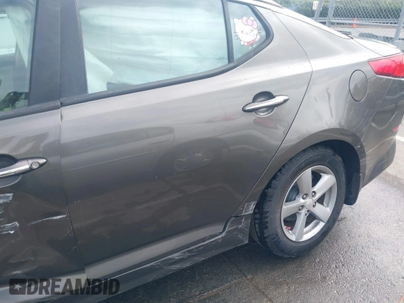 2015 Kia Optima LX with VIN 5XXGM4A72FG400848, listed as a IAAI auction lot 40802198 with 173,270 mi miles and . Bid and sale history available at DreamBid. Image 12.
