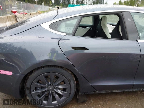 2017 Tesla Model S 100D with VIN 5YJSA1E26HF224568, listed as a IAAI auction lot 42140201 with 102,403 mi miles. Bid and sale history available at carsss.com. Image 6.