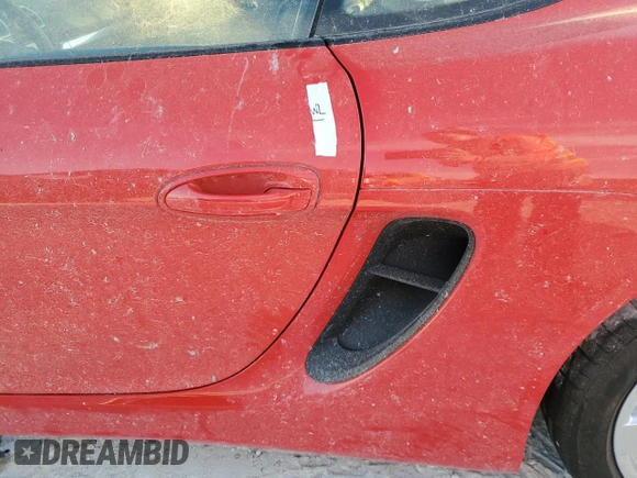 2015 Porsche Cayman S with VIN WP0AB2A80FK184769, listed as a Copart auction lot 77851604 with Not Provided miles and Salvage Title. Bid and sale history available at DreamBid. Image 12.
