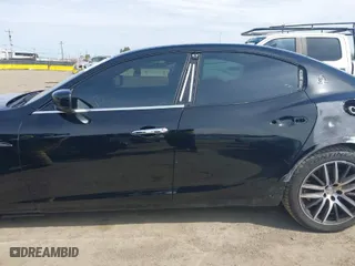 2015 Maserati Ghibli with VIN ZAM57XSA9F1146055, listed as a IAAI auction lot 41814633 with 88,783 mi miles. Bid and sale history available at carsss.com. Image 15.