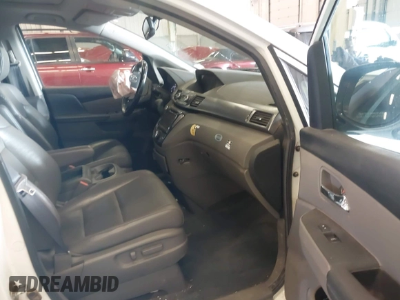 2014 Honda Odyssey EX-L with VIN 5FNRL5H60EB030841, listed as a IAAI auction lot 42271401 with 107,343 mi miles and . Bid and sale history available at DreamBid. Image 5.