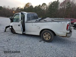 2000 Ford F-150 XL with VIN 2FTRF17L6YCA50613, listed as a Copart auction lot 83528344 with Not provided miles and Salvage title. Bid and sale history available at DreamBid. Image 2.