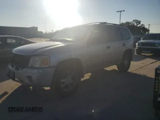 2006 GMC Envoy SLE with VIN 1GKDS13S962219216, listed as a Copart auction lot 71656164 with 328,966 mi miles and Salvage Title. Bid and sale history available at carsss.com. Image 1.