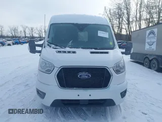 2022 Ford Transit Passenger XL with VIN 1FBAX9C87NKA80161, listed as a IAAI auction lot 41389325 with 128,868 mi miles and . Bid and sale history available at DreamBid. Image 13.