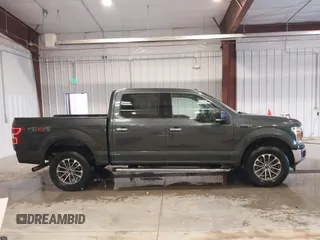 2018 Ford F-150 XL with VIN 1FTEW1EG3JKE52823, listed as a IAAI auction lot 41413009 with 142,057 mi miles. Bid and sale history available at carsss.com. Image 13.