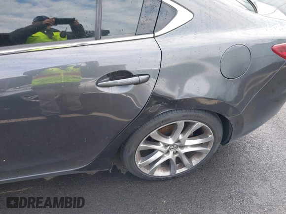 2014 Mazda 6 i Grand Touring with VIN JM1GJ1W63E1147380, listed as a IAAI auction lot 41928637 with 140,091 mi miles and . Bid and sale history available at DreamBid. Image 18.