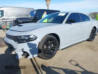 2021 Dodge Charger GT with VIN 2C3CDXHG7MH603660, listed as a IAAI auction lot 41910624 with 49,394 mi miles and . Bid and sale history available at DreamBid. Image 2.