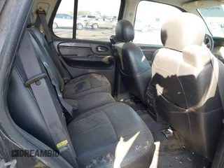 2005 GMC Envoy SLE with VIN 1GKDT13S752161375, listed as a IAAI auction lot 40945627 with 172,757 mi miles. Bid and sale history available at carsss.com. Image 8.