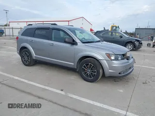 2018 Dodge Journey SE with VIN 3C4PDCABXJT295391, listed as a IAAI auction lot 41707149 with 134,221 mi miles. Bid and sale history available at carsss.com. Image 1.
