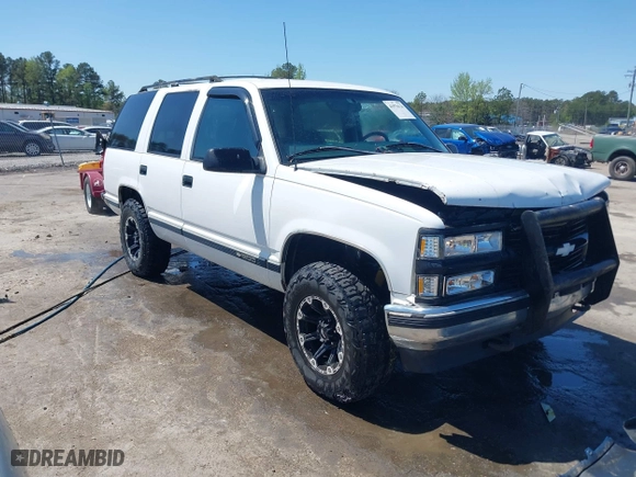 1997 Chevrolet Tahoe with VIN 1GNEK13R8VJ338626, listed as a IAAI auction lot 41976126 with 163,263 mi miles. Bid and sale history available at carsss.com. Image 1.