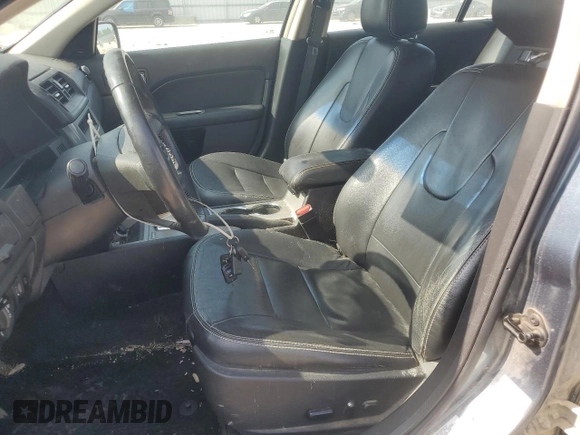 2012 Ford Fusion SEL with VIN 3FAHP0JA6CR412195, listed as a Copart auction lot 60922115 with 266,219 mi miles and Salvage title. Bid and sale history available at DreamBid. Image 7.
