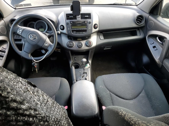 2010 Toyota RAV4 Sport z VIN JTMRK4DV8A5096558, wystawiony jako Copart lot #52079905 z przebiegiem 122 448 mil mil oraz Czysty tytuł • Clean title. Historia ofert i sprzedaży dostępna na DreamBid. Obrazek 8.