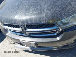 2013 Dodge Durango SXT with VIN 1C4RDHAG2DC673236, listed as a IAAI auction lot 42506024 with 198,215 mi miles and . Bid and sale history available at DreamBid. Image 12.