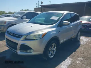 2014 Ford Escape SE with VIN 1FMCU9GX6EUB22401, listed as a IAAI auction lot 42038712 with Not Provided miles and . Bid and sale history available at carsss.com. Image 2.