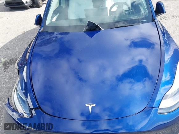 2025 Tesla Model Y Long Range z VIN 7SAYGDED0SF256650, wystawiony jako IAAI lot #41993206 z przebiegiem Nie podano mil oraz . Historia ofert i sprzedaży dostępna na DreamBid. Obrazek 10.